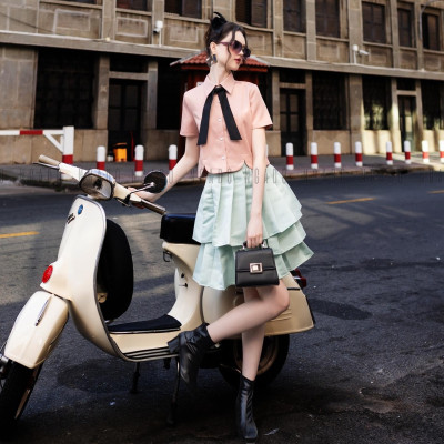 Chân váy xanh mint xếp ly NGADO