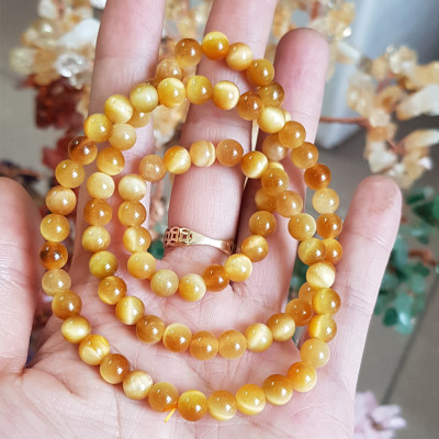 Vòng tay đá Mắt Hổ vàng tươi đồng tâm quấn 3 vòng 6ly