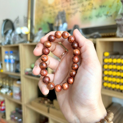 Vòng tay gỗ nu huyết Long - size 10li - Thấu quang - Mùi thơm vĩnh viễn