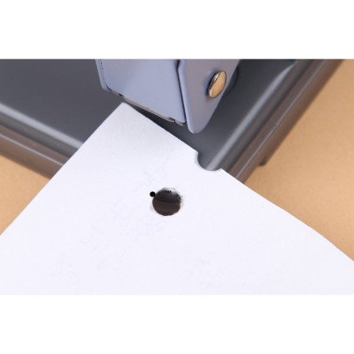 DKJ7703	Đục 2 lỗ 35 tờ Guangbo