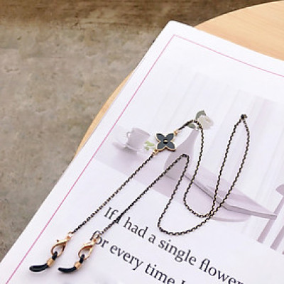 Chuỗi đeo mắt kính ngắn tone đen trắng mắt kính sành điệu hoa cỏ bốn lá dây chuyền đeo tai nghe bluetooth quà tặng đặc biệt