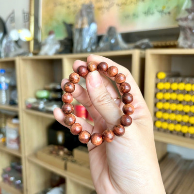 Vòng tay gỗ nu huyết Long - size 10li - Thấu quang - Mùi thơm vĩnh viễn