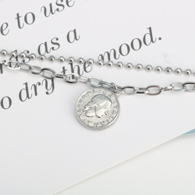 Lắc tay mặt đồng xu cổ punk rock