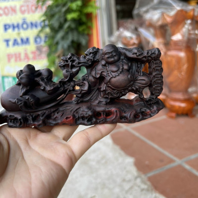Tượng phật di lặc kéo bao tiền bằng gỗ trắc đỏ đen kt 15×4×7cm 
