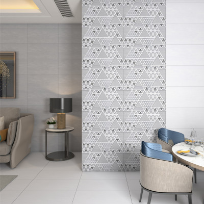 Gạch men ốp tường LUSTRA INCEF0300600013D1 màu xám trắng chủ đạo, hoa văn hình tam giác mạnh mẽ, độ hút ẩm thấp (<0.5%), kích thước 300mmx600mm- Hàng chính hãng