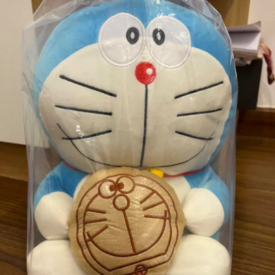 Thú nhồi bông Doraemon ôm bánh rán - Size từ 40cm đến 80cm - Quà tặng gấu bông Doraemon dễ thương.