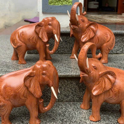 Cặp tượng voi phong thủy bằng gỗ hương đá kt 30cm 