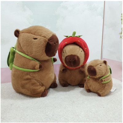 Thú nhồi bông capybara đội mũ dâu tây đáng yêu - Size từ 35cm đến 85cm - Quà tặng gấu bông capybara mang balô dâu tây trên lưng - Gối ôm chuột lang dễ thương cho bé.