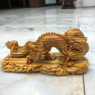 Tượng con rồng phong thủy cầu tài lộc bằng gỗ huyết long kt 20×10×8cm 