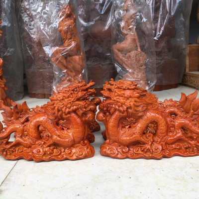 Tượng con rồng phong thủy  bằng gỗ hương đá kt 25×14×7cm 