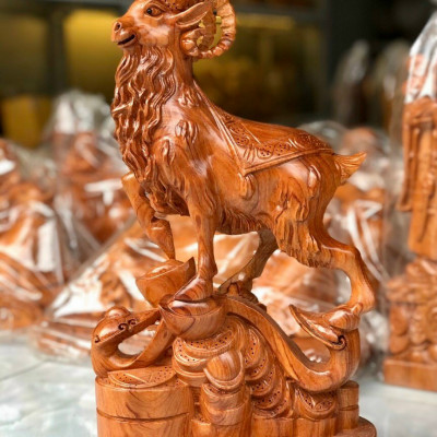 Tượng con dê phong thủy hút tài lộc bằng gỗ hương đá kt 50×17×13cm