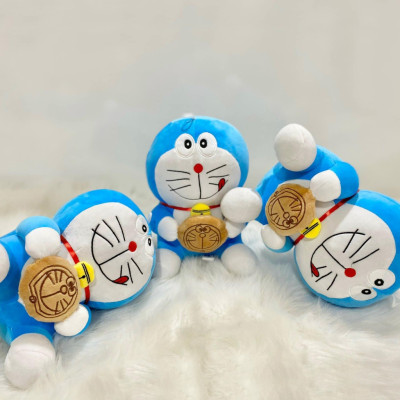 Thú nhồi bông Doraemon ôm bánh rán - Size từ 40cm đến 80cm - Quà tặng gấu bông Doraemon dễ thương.