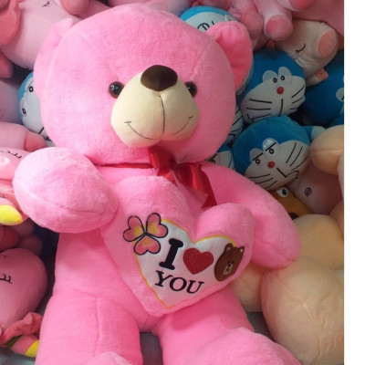 Gấu bông Teddy ôm tim - Size từ 1m1 đến 1m5 - Quà tặng gấu bông teddy vải lông tuyết mịn.