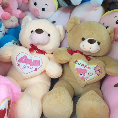 Gấu bông Teddy ôm tim - Size từ 1m1 đến 1m5 - Quà tặng gấu bông teddy vải lông tuyết mịn.