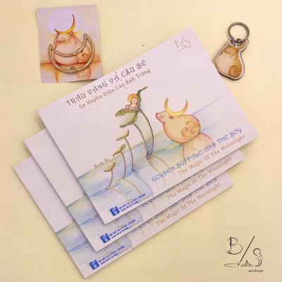 Sách hay - Sách thiếu nhi - Truyện cổ tích song ngữ Anh Việt "TRÂU VÀNG VÀ CẬU BÉ – Sự huyền diệu của Ánh Trăng" - Art book - Pig Moon Bookstore