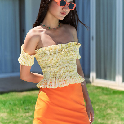 DOTTIE - Chân váy ngắn vạt tròn nữ cam S0127